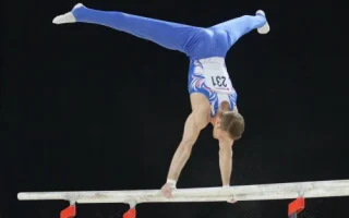 Parallel Bars dalam Senam Kompetitif: Peraturan dan Skor