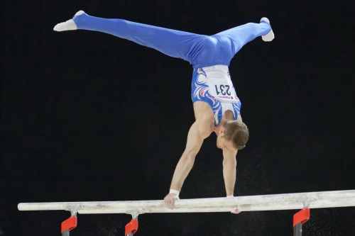 Parallel Bars dalam Senam Kompetitif: Peraturan dan Skor
